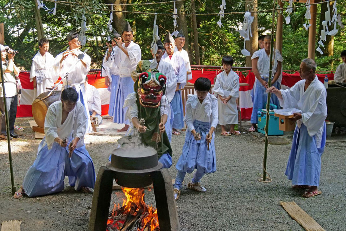 Performers take part in a Hakone-no-yutate shishimai dance in Miyagino.