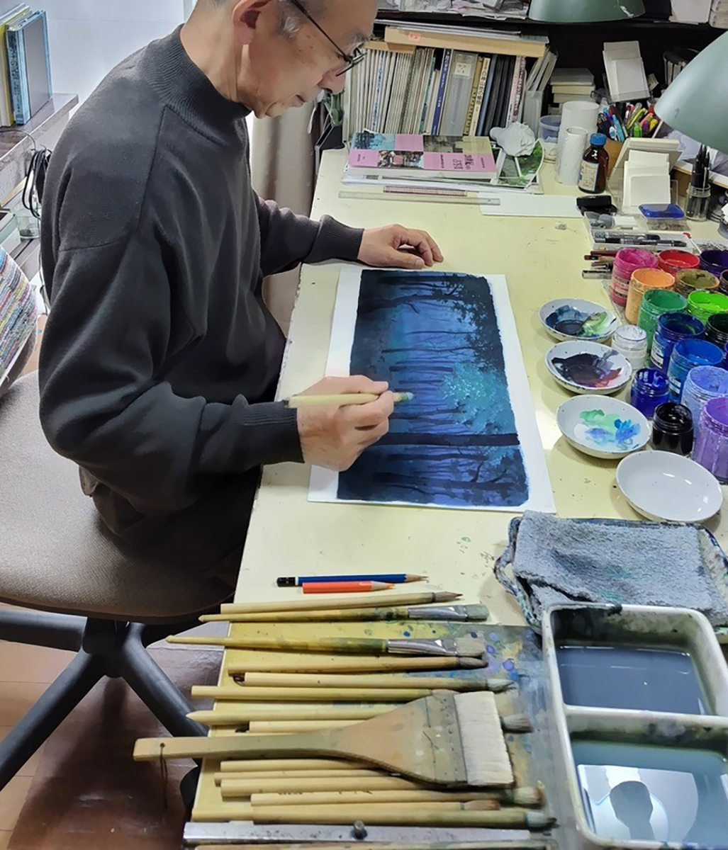 Anime artist Kazuo Oga works on a background scene for the famed bunraku play "The Love Suicides at Sonezaki." | TOMOKO OGAWA